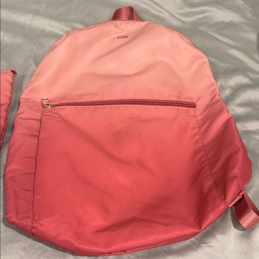 Tumi Pink Backpack